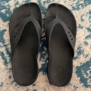 Women’s black Croc flip flops size 6